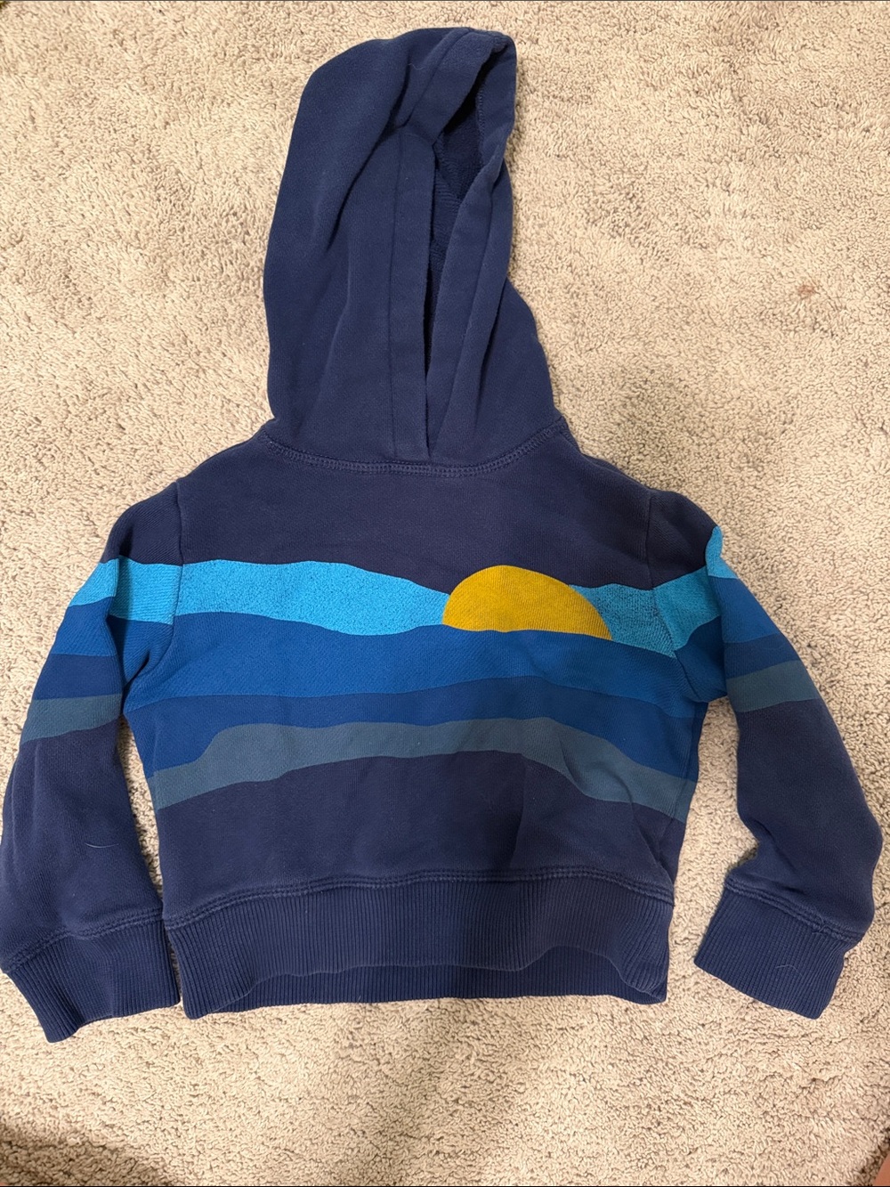 Faherty Navy Hoodie with Blue Wave Stripes and Yellow Sun